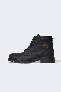 Men's Lace-up and Zipper Serrated Sole Winter Faux Leather Boots offre à 399 Dh sur Defacto